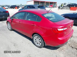 2014 Kia Rio LX with VIN KNADM4A32E6334330, listed as a IAAI auction lot 42239542 with 134,314 mi miles and . Bid and sale history available at DreamBid. Image 3.