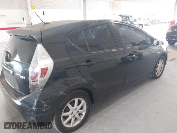 2013 Toyota Prius One z VIN JTDKDTB33D1046251, wystawiony jako IAAI lot #42304087 z przebiegiem 229 655 mil mil oraz . Historia ofert i sprzedaży dostępna na DreamBid. Obrazek 13.