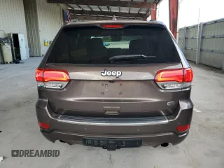2017 Jeep Grand Cherokee Overland with VIN 1C4RJFCTXHC768687, listed as a Copart auction lot 51442495 with 123,578 mi miles and Clean Title. Bid and sale history available at carsss.com. Image 6.