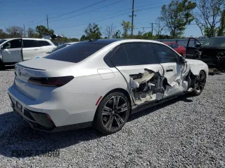 2023 BMW 7 Series 740i z VIN WBA23EH05PCN58157, wystawiony jako Copart lot #49460585 z przebiegiem Nie podano mil oraz Szkoda całkowita • Salvage title. Historia ofert i sprzedaży dostępna na DreamBid. Obrazek 3.