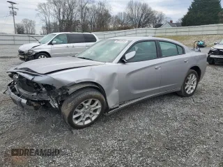 2015 Dodge Charger SXT with VIN 2C3CDXJG2FH813712, listed as a Copart auction lot 88148585 with Not provided miles and Salvage title. Bid and sale history available at DreamBid. Image 1.