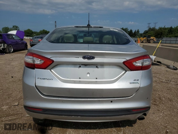 2016 Ford Fusion SE z VIN 3FA6P0HDXGR369218, wystawiony jako Copart lot #61225875 z przebiegiem 176 559 mil mil oraz Szkoda całkowita • Salvage title. Historia ofert i sprzedaży dostępna na DreamBid. Obrazek 6.