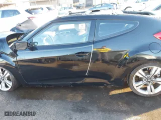 2014 Hyundai Veloster with VIN KMHTC6AD3EU184600, listed as a IAAI auction lot 41300088 with 1 mi miles. Bid and sale history available at carsss.com. Image 14.