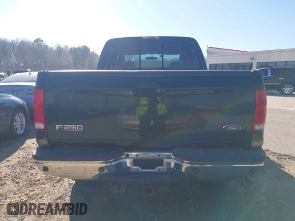 2003 Ford Super Duty F-250 XL with VIN 1FTNW21S23EA08088, listed as a IAAI auction lot 41671180 with 250,765 mi miles. Bid and sale history available at carsss.com. Image 16.