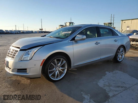 2014 Cadillac XTS Premium with VIN 2G61P5S35E9288781, listed as a Copart auction lot 41873065 with 64,936 mi miles and Salvage Title. Bid and sale history available at DreamBid. Image 1.
