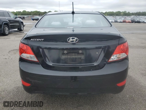2014 Hyundai Accent GLS z VIN KMHCT4AE6EU705838, wystawiony jako Copart lot #58581515 z przebiegiem 40 265 mil mil oraz Szkoda całkowita • Salvage title. Historia ofert i sprzedaży dostępna na DreamBid. Obrazek 6.