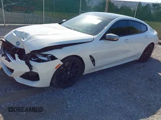 2022 BMW 8 Series M850i with VIN WBAGV8C09NCH15245, listed as a IAAI auction lot 42053154 with 26,384 mi miles and . Bid and sale history available at DreamBid. Image 17.
