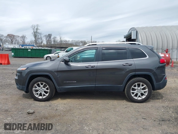2014 Jeep Cherokee Latitude with VIN 1C4PJMCS5EW201459, listed as a IAAI auction lot 42092653 with 147,430 mi miles. Bid and sale history available at carsss.com. Image 14.