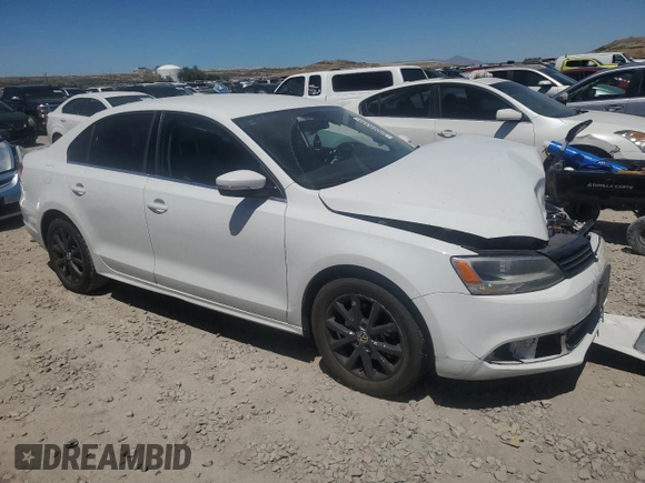 2014 Volkswagen Jetta SE with VIN 3VWD17AJ6EM265926, listed as a Copart auction lot 59060335 with 113,994 mi miles and Salvage title. Bid and sale history available at DreamBid. Image 4.