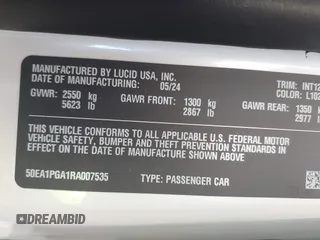 2024 Lucid Air Pure with VIN 50EA1PGA1RA007535, listed as a IAAI auction lot 41879547 with 2,497 mi miles. Bid and sale history available at carsss.com. Image 9.
