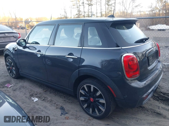 2016 MINI Cooper Hardtop 4 Door S with VIN WMWXU3C56G2B63682, listed as a IAAI auction lot 41244676 with 110,902 mi miles. Bid and sale history available at carsss.com. Image 15.