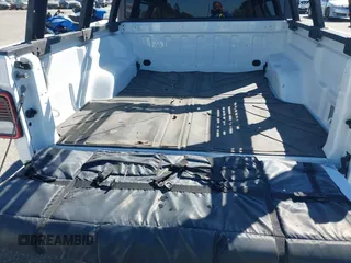 2022 Jeep Gladiator Mojave z VIN 1C6JJTEG0NL103523, wystawiony jako IAAI lot #41842011 z przebiegiem 36 160 mil mil oraz . Historia ofert i sprzedaży dostępna na DreamBid. Obrazek 18.