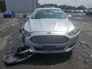 2013 Ford Fusion SE Hybrid с VIN 3FA6P0LU8DR240784, выставлен на аукционе Copart как лот 60202425 с пробегом 159 284 миль миль и Списание • Salvage title. История ставок и продаж доступна на DreamBid. Изображение 5.