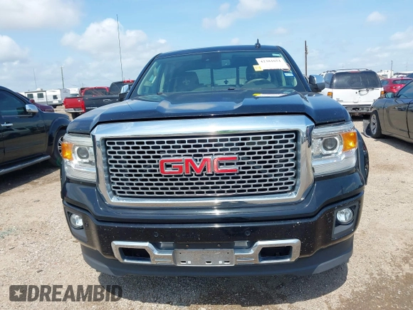 2015 GMC Sierra 1500 Denali z VIN 3GTU2WEJ9FG386812, wystawiony jako IAAI lot #42381651 z przebiegiem 138 009 mil mil oraz . Historia ofert i sprzedaży dostępna na DreamBid. Obrazek 6.