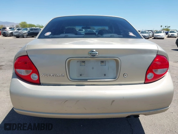 2000 Nissan Maxima GXE z VIN JN1CA31D0YT739248, wystawiony jako IAAI lot #42089086 z przebiegiem 140 979 mil mil oraz . Historia ofert i sprzedaży dostępna na DreamBid. Obrazek 16.