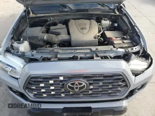 2020 Toyota Tacoma SR5 with VIN 3TMDZ5BN6LM097302, listed as a Copart auction lot 57503895 with 77,212 mi miles and Salvage title. Bid and sale history available at DreamBid. Image 11.