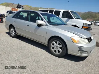2001 Toyota Avalon XL z VIN 4T1BF28B11U154831, wystawiony jako Copart lot #57131435 z przebiegiem 211 745 mil mil oraz Szkody całkowita. Historia ofert i sprzedaży dostępna na DreamBid. Obrazek 4.