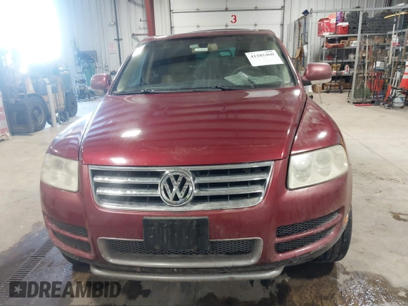 2004 Volkswagen Touareg z VIN WVGCM67LX4D038012, wystawiony jako IAAI lot #41285460 z przebiegiem Nie podano mil oraz . Historia ofert i sprzedaży dostępna na DreamBid. Obrazek 12.
