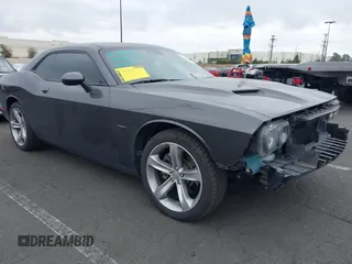 2015 Dodge Challenger R/T with VIN 2C3CDZAT5FH710566, listed as a IAAI auction lot 42042697 with 97,206 mi miles and . Bid and sale history available at DreamBid. Image 1.