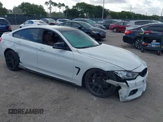 2016 BMW 4 Series 428i with VIN WBA4A9C5XGG508341, listed as a IAAI auction lot 41565438 with 69,944 mi miles. Bid and sale history available at carsss.com. Image 1.
