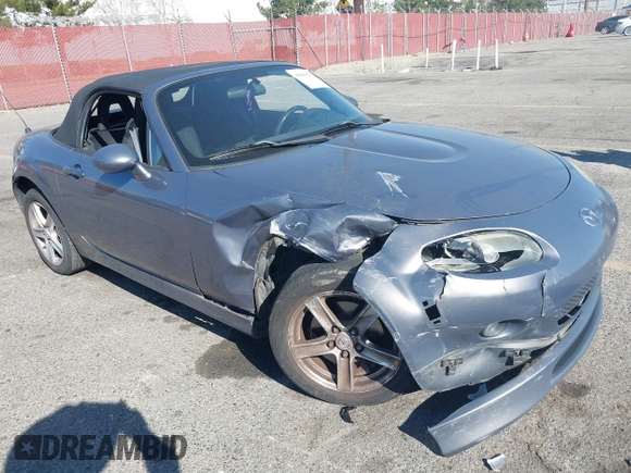 2006 Mazda MX-5 Miata Touring z VIN JM1NC25F960112536, wystawiony jako IAAI lot #41868290 z przebiegiem 153 162 mil mil oraz . Historia ofert i sprzedaży dostępna na DreamBid. Obrazek 1.