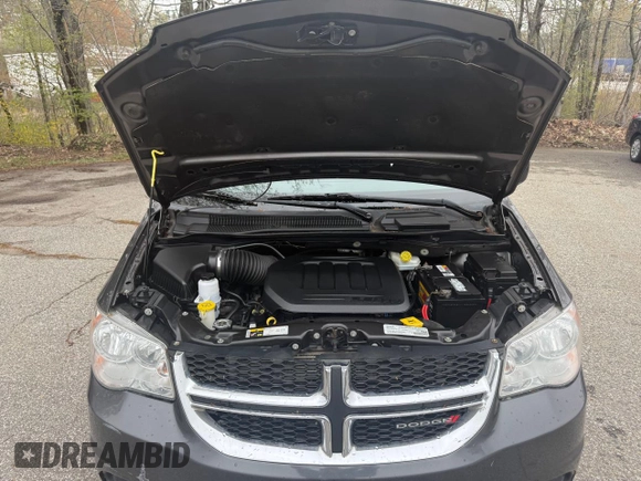 2019 Dodge Grand Caravan SE with VIN 2C4RDGBG2KR718687, listed as a Copart auction lot 55877605 with 199,604 mi miles and Clean Title. Bid and sale history available at DreamBid. Image 7.