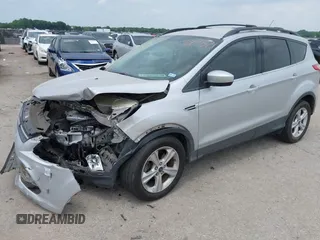 2013 Ford Escape SE with VIN 1FMCU0GX9DUD68711, listed as a IAAI auction lot 42243521 with 120,441 mi miles and . Bid and sale history available at DreamBid. Image 2.