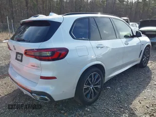 2023 BMW X5 xDrive45e with VIN 5UXTA6C06P9P51357, listed as a IAAI auction lot 41396257 with 43,878 mi miles. Bid and sale history available at carsss.com. Image 4.