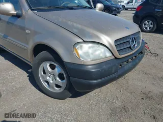 2001 Mercedes-Benz M-Class with VIN 4JGAB54E71A245256, listed as a IAAI auction lot 41697960 with 191,911 mi miles. Bid and sale history available at carsss.com. Image 6.