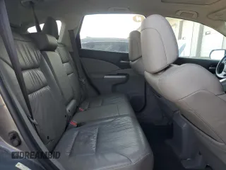 2013 Honda CR-V EX-L z VIN 2HKRM4H72DH644399, wystawiony jako Copart lot #57023265 z przebiegiem 206 344 mil mil oraz Szkoda całkowita • Salvage title. Historia ofert i sprzedaży dostępna na DreamBid. Obrazek 11.