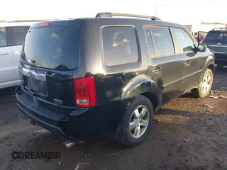 2009 Honda Pilot EX-L with VIN 5FNYF48659B012032, listed as a IAAI auction lot 41801232 with 205,636 mi miles and . Bid and sale history available at carsss.com. Image 4.