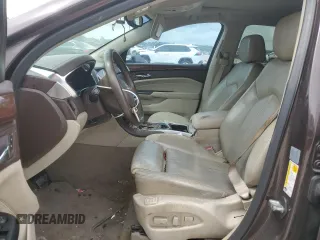 2015 Cadillac SRX Performance Collection with VIN 3GYFNCE38FS571733, listed as a Copart auction lot 54946215 with 147,343 mi miles and Salvage title. Bid and sale history available at DreamBid. Image 7.
