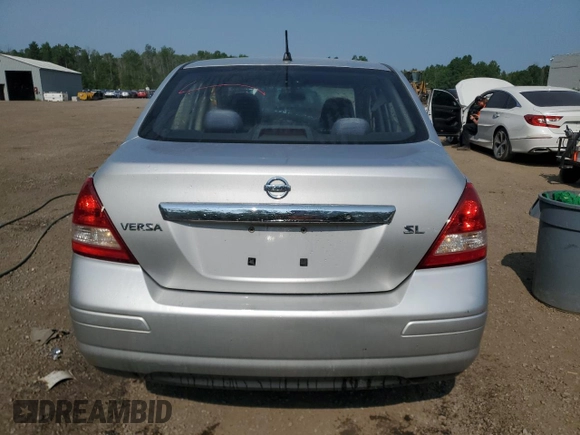 2007 Nissan Versa SL with VIN 3N1BC11E87L401537, listed as a Copart auction lot 60481435 with 383,005 mi miles and Salvage title. Bid and sale history available at DreamBid. Image 6.