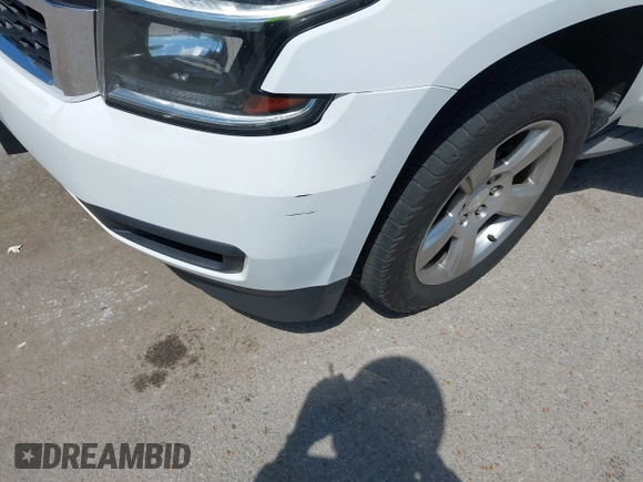 2015 Chevrolet Tahoe LT with VIN 1GNSKBKC8FR194164, listed as a IAAI auction lot 42315215 with 211,797 mi miles and . Bid and sale history available at DreamBid. Image 18.