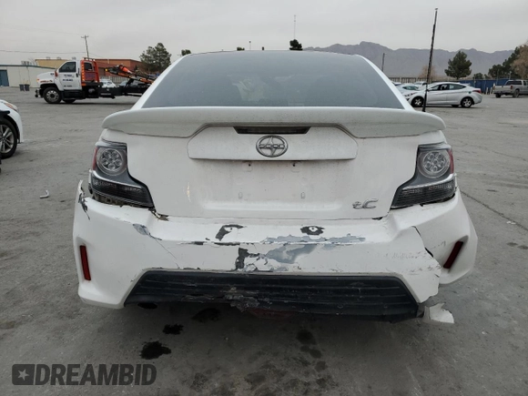 2014 Scion tC z VIN JTKJF5C7XE3079538, wystawiony jako Copart lot #85018414 z przebiegiem 136 905 mil mil oraz Czysty tytuł • Clean title. Historia ofert i sprzedaży dostępna na DreamBid. Obrazek 6.