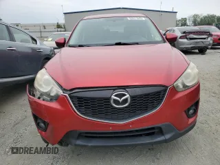 2014 Mazda CX-5 Touring z VIN JM3KE4CY3E0382106, wystawiony jako Copart lot #55521645 z przebiegiem 84 539 mil mil oraz Szkoda całkowita • Salvage title. Historia ofert i sprzedaży dostępna na DreamBid. Obrazek 5.