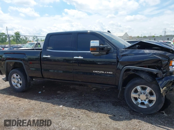 2015 GMC Sierra 2500HD Denali with VIN 1GT120E82FF574358, listed as a IAAI auction lot 42377676 with 86,097 mi miles and . Bid and sale history available at DreamBid. Image 13.