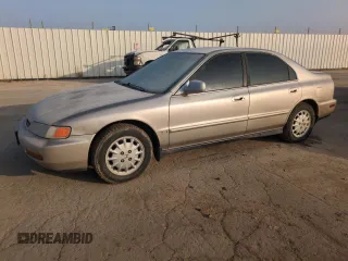 1996 Honda Accord with VIN 1HGCD555XTA167694, listed as a Copart auction lot 83733044 with 132,059 mi miles and Salvage title. Bid and sale history available at DreamBid. Image 1.