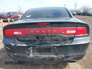 2014 Dodge Charger SE with VIN 2C3CDXBG4EH268898, listed as a IAAI auction lot 41790753 with 318,732 mi miles and . Bid and sale history available at DreamBid. Image 16.