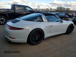2016 Porsche 911 4S with VIN WP0BB2A93GS136097, listed as a Copart auction lot 76078574 with 14,208 mi miles and Salvage Title. Bid and sale history available at DreamBid. Image 3.