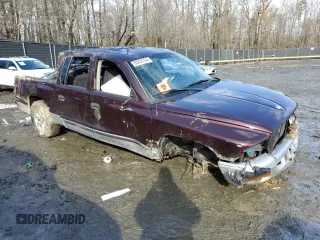2004 Dodge Dakota SLT with VIN 1D7HL48K34S736938, listed as a Copart auction lot 85283154 with Not Provided miles and Salvage Title. Bid and sale history available at DreamBid. Image 4.