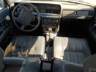 1993 Volvo 240 z VIN YV1AW8311P1955233, wystawiony jako Copart lot #76514004 z przebiegiem 216 723 mil mil oraz Szkody całkowita. Historia ofert i sprzedaży dostępna na DreamBid. Obrazek 8.