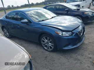 2014 Mazda 6 i Touring with VIN JM1GJ1V6XE1154456, listed as a IAAI auction lot 41997946 with 33,844 mi miles and . Bid and sale history available at DreamBid. Image 1.