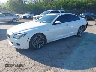 2016 BMW 6 Series 640i xDrive with VIN WBA6D2C51GGT66209, listed as a IAAI auction lot 42064405 with 113,500 mi miles and . Bid and sale history available at carsss.com. Image 18.