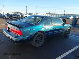 1996 Ford Thunderbird LX with VIN 1FALP62W1TH100925, listed as a IAAI auction lot 41289811 with 84,056 mi miles and . Bid and sale history available at DreamBid. Image 4.
