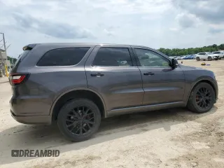 2015 Dodge Durango Limited with VIN 1C4RDJDG0FC904897, listed as a Copart auction lot 58985025 with 147,139 mi miles and Salvage title. Bid and sale history available at DreamBid. Image 3.