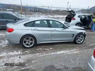 2016 BMW 4 Series 428i xDrive with VIN WBA4C9C53GG136870, listed as a IAAI auction lot 41410071 with 116,187 mi miles and . Bid and sale history available at DreamBid. Image 13.