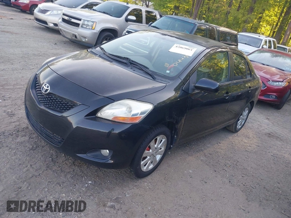 2009 Toyota Yaris with VIN JTDBT903894044347, listed as a IAAI auction lot 42069061 with 197,348 mi miles. Bid and sale history available at carsss.com. Image 2.