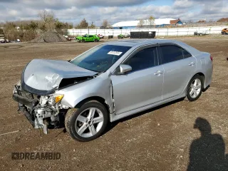 2012 Toyota Camry L with VIN 4T1BF1FK2CU579720, listed as a Copart auction lot 80243884 with 142,601 mi miles and Salvage Title. Bid and sale history available at DreamBid. Image 1.