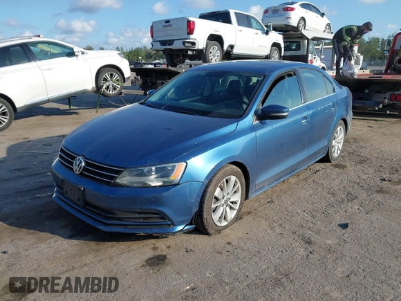 2016 Volkswagen Jetta Sedan 1.4T SE with VIN 3VWD67AJ0GM328412, listed as a IAAI auction lot 41556254 with 137,814 mi miles. Bid and sale history available at carsss.com. Image 17.